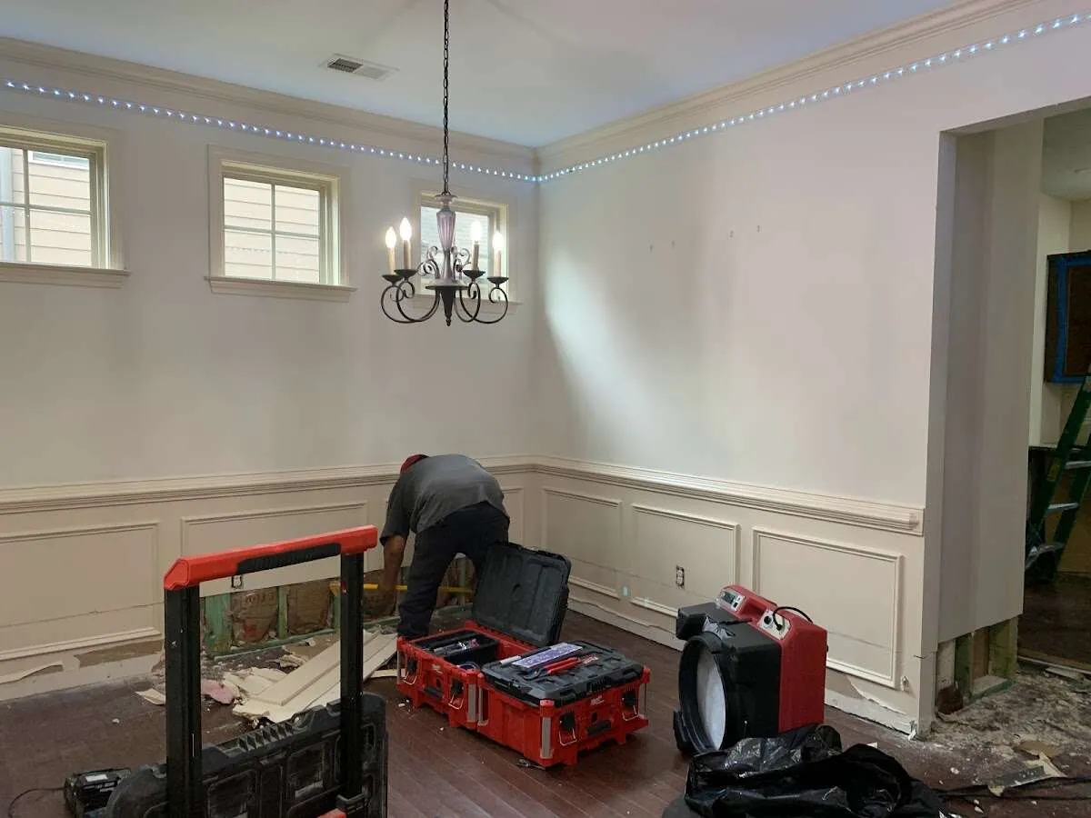 Restoration technician with professional equipment in Brookhaven